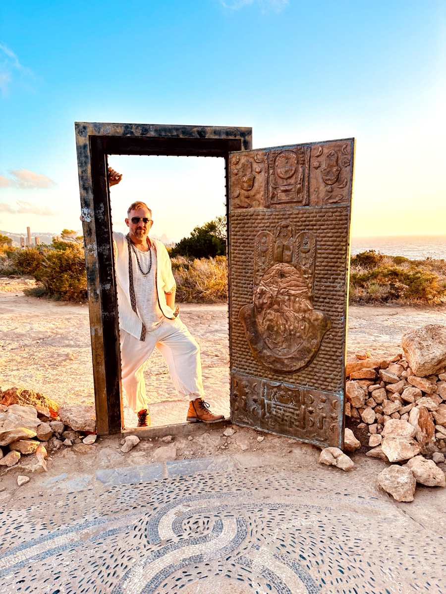 Xaguar in a stone doorway at sunset